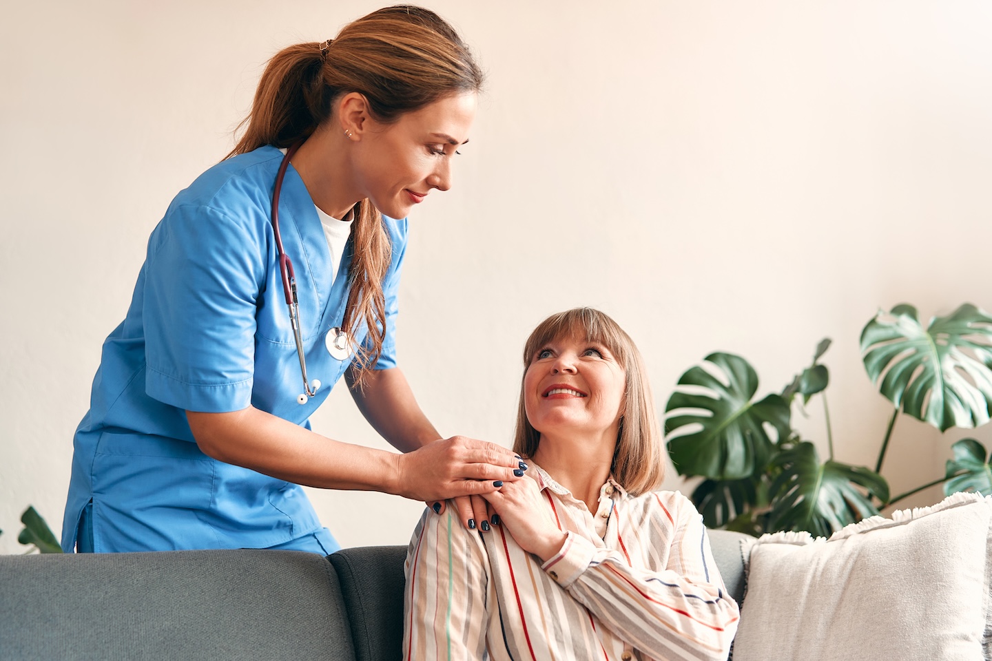 An Ivanna HomeCare caregiver with a senior client at home.